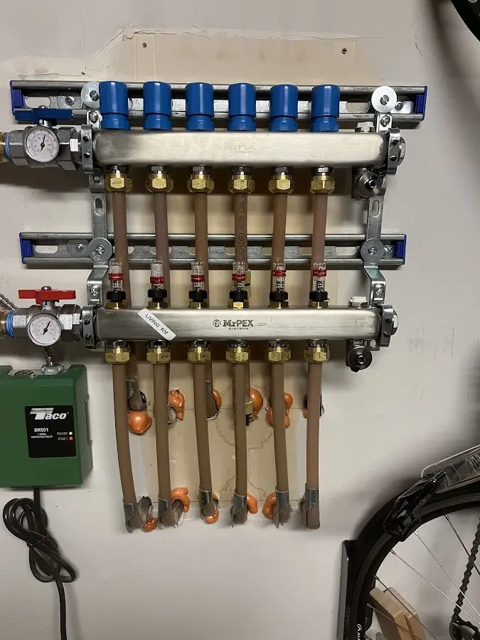 Plumber performing Water Heater Repair at a residential property in Robinson